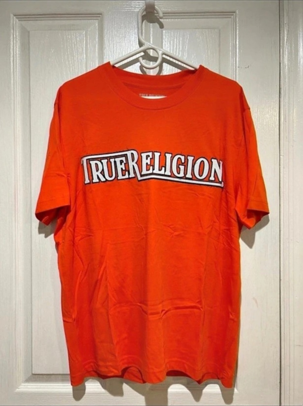 True Religion Graphic Logo Short Sleeve Tee in Orange